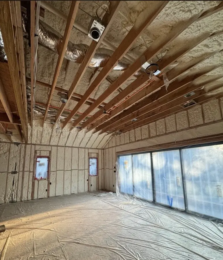 Interior walls and ceiling insulated with spray foam during new construction in Cambria